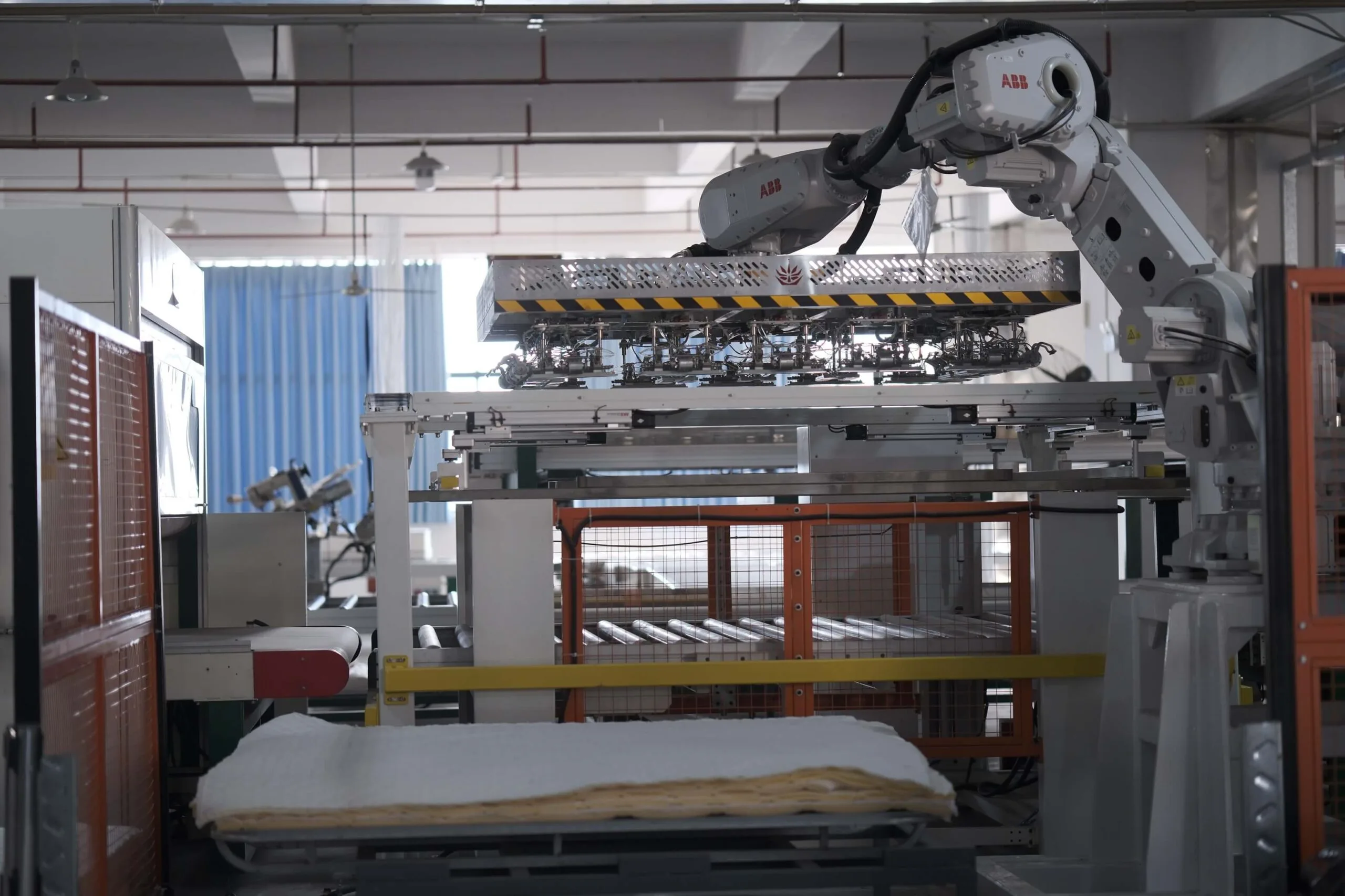 Automated equipment used in high-efficiency mattress manufacturing
