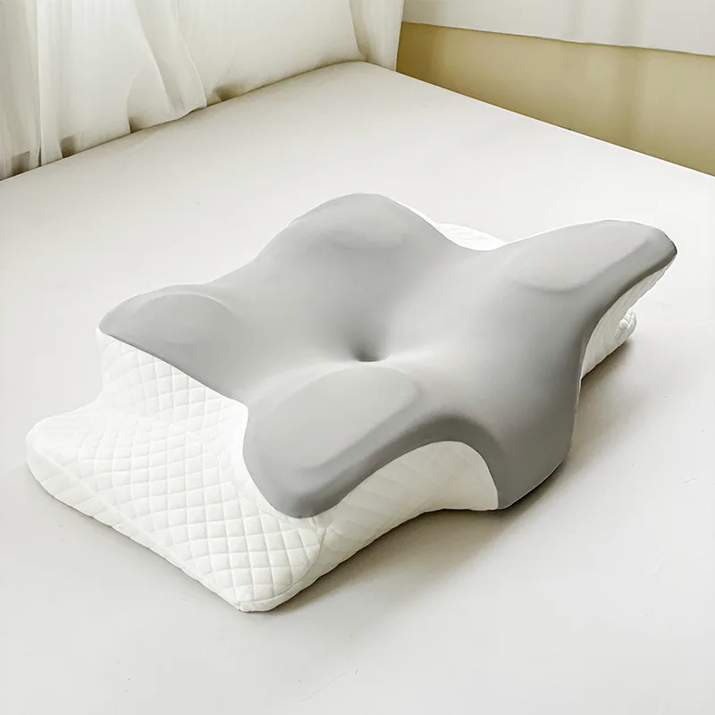 Ergonomic pillow on white bed linen