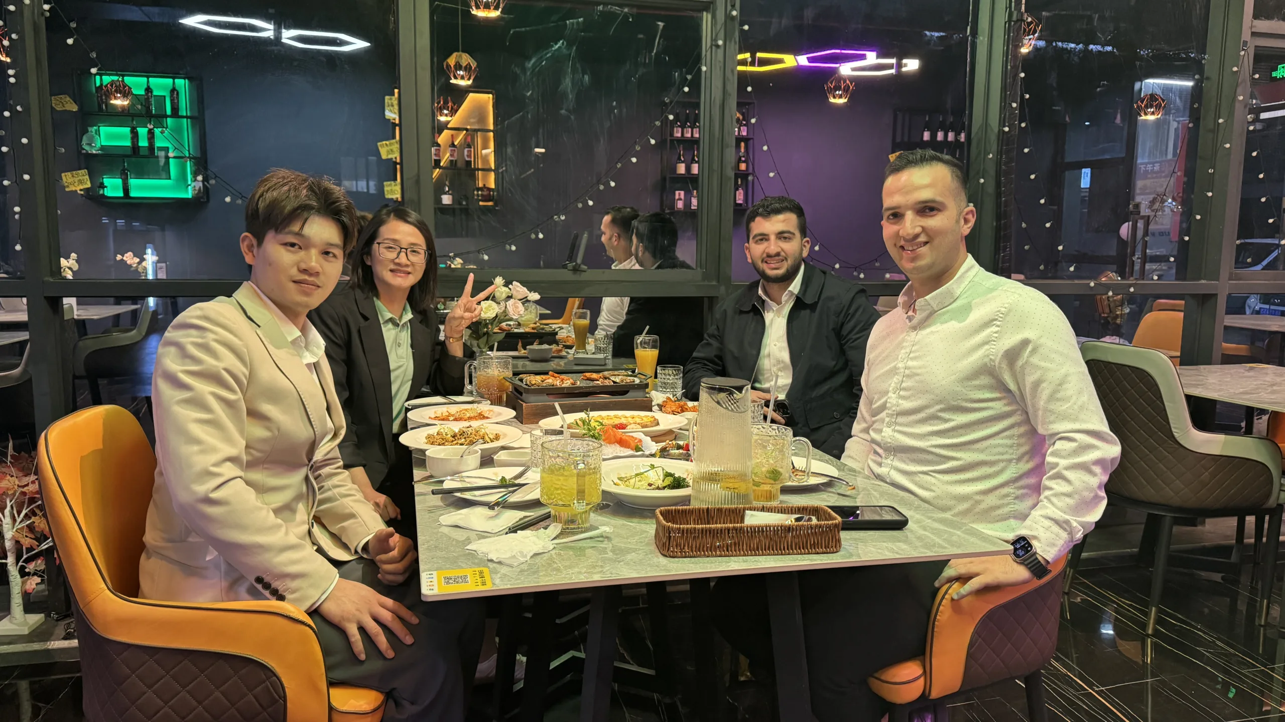 Enjoying a business dinner with international clients
