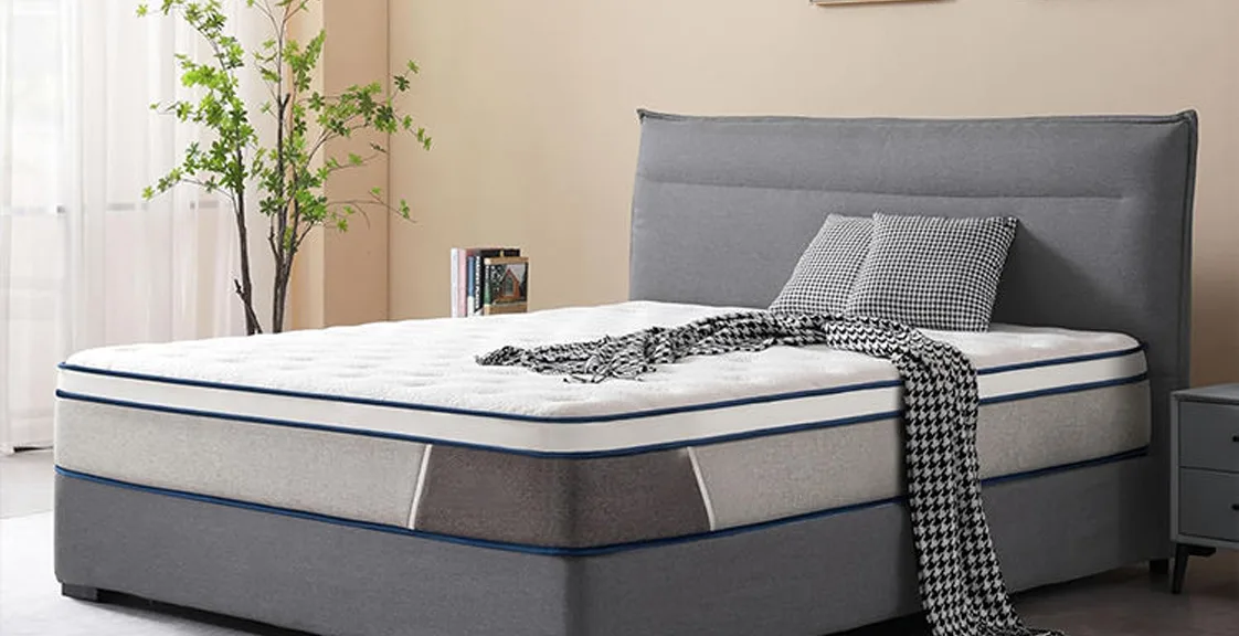 A lux hybrid mattress displayed in a modern bedroom, showing its comfort and supportive design
