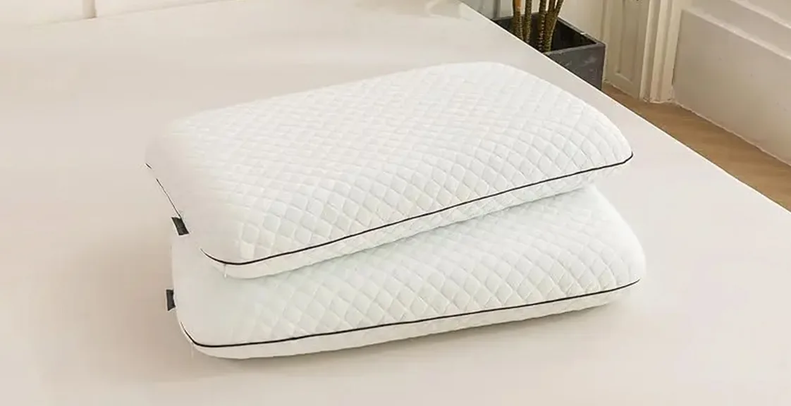 Two Memory Foam King Pillows stacked on top of each other, showing their soft texture and ergonomic design