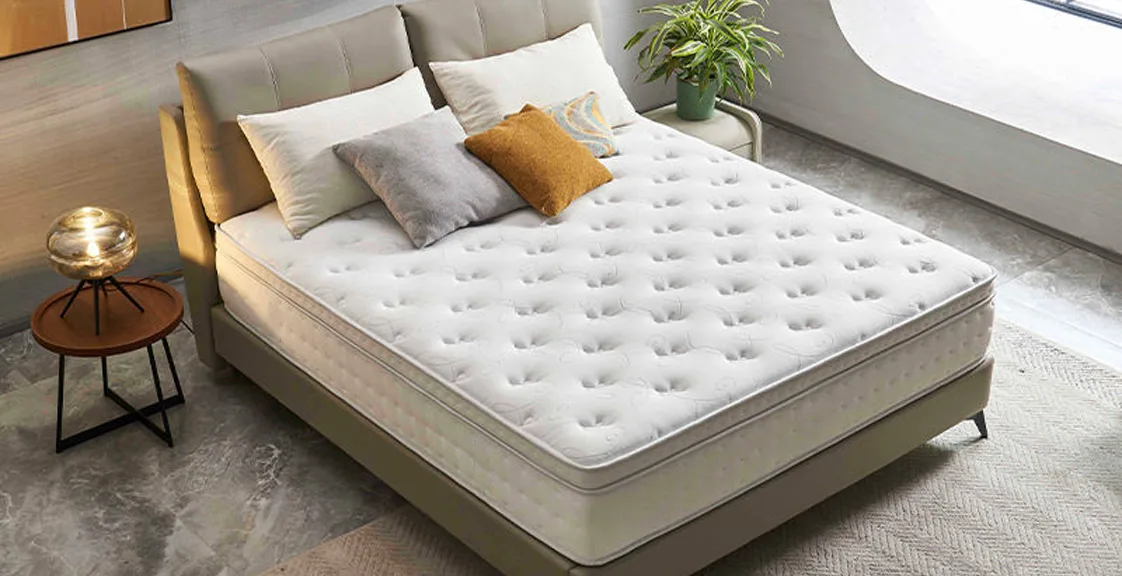 A white mattress in bedroom