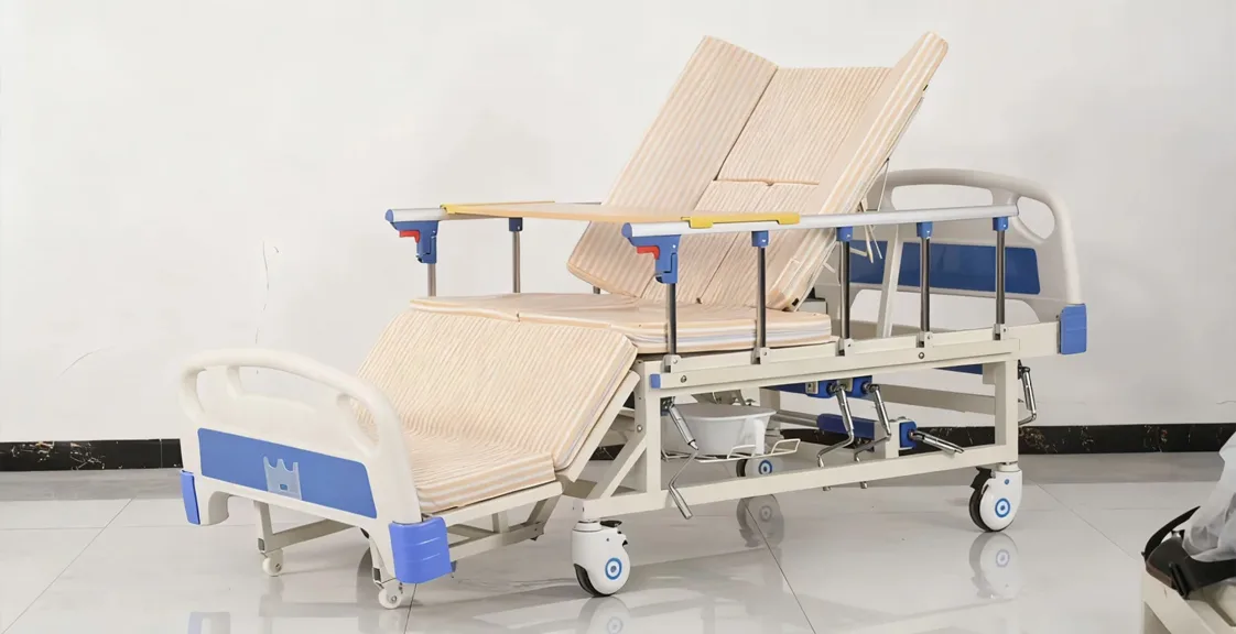 Adjustable hospital bed equipped with a medical foam mattress for clinical care and patient positioning