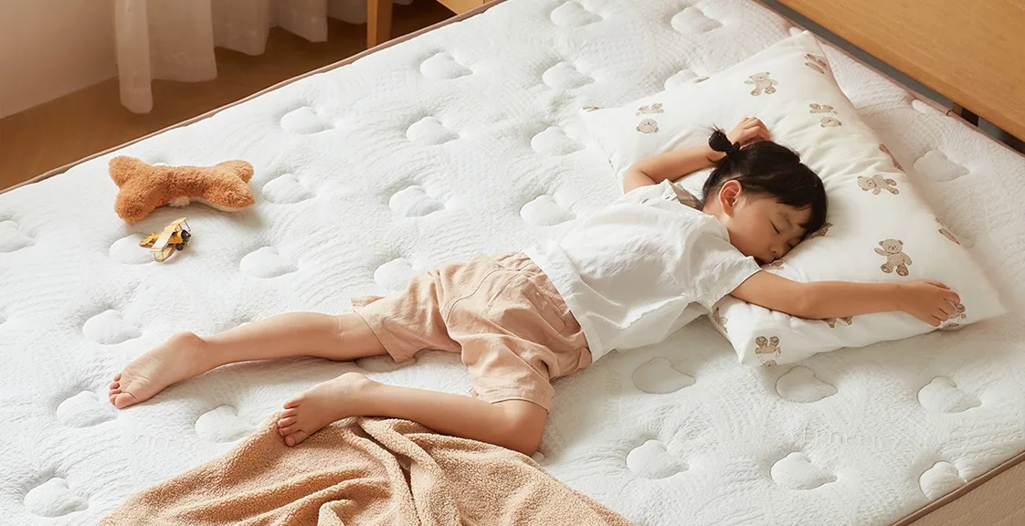 Child sleeping on a soft mattress with poor posture