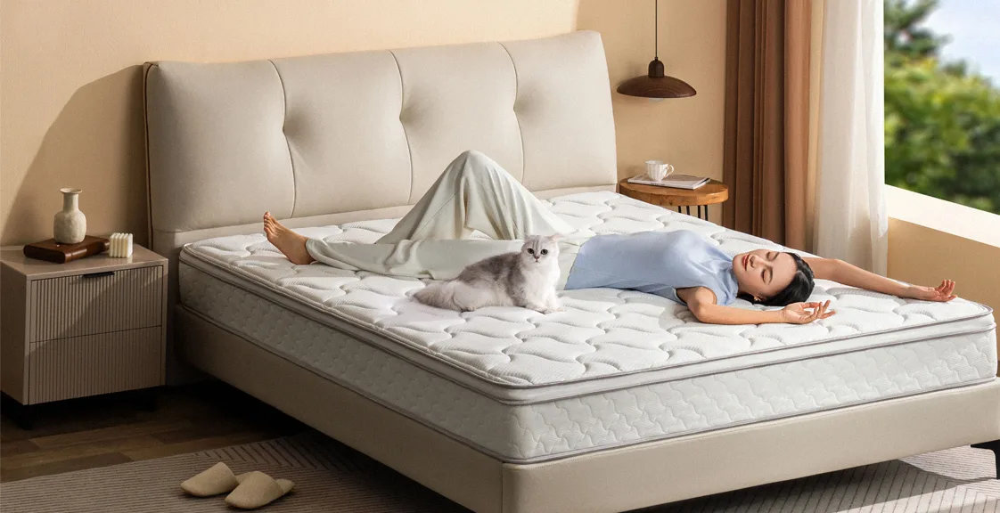 Woman lying on mattress showing soft vs firm mattress comfort for daily sleep