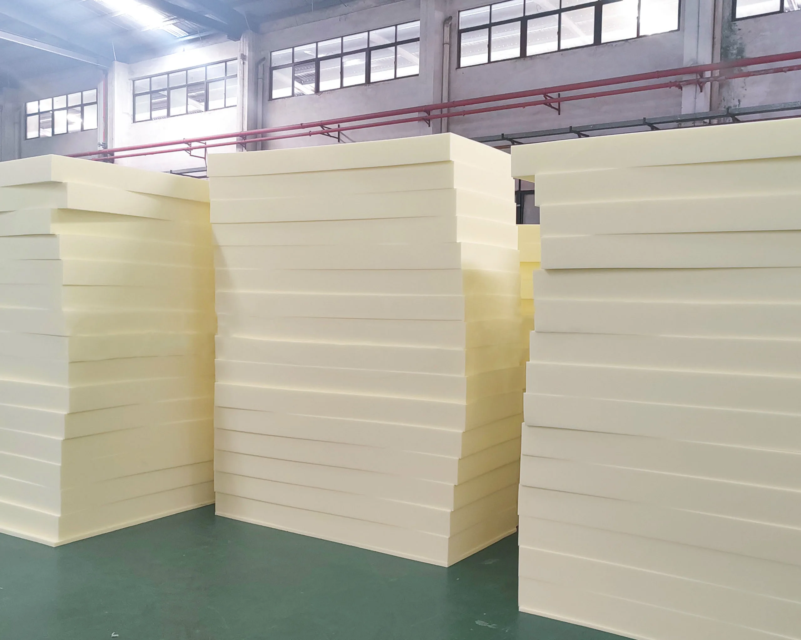 Finished foam products neatly stored in warehouse, well-organized for quick access and efficient mattress production use
